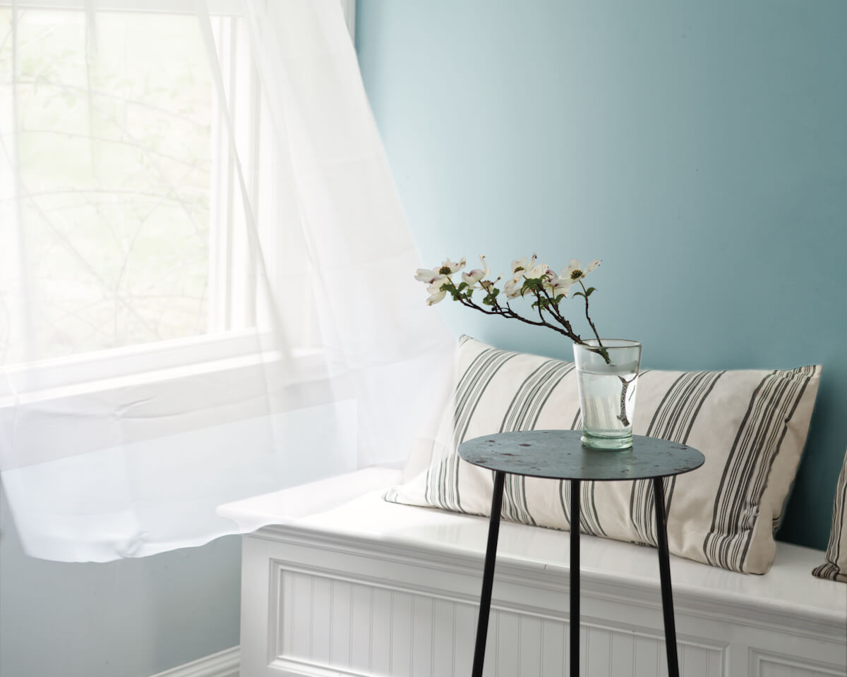 Window bench with patterned pillow